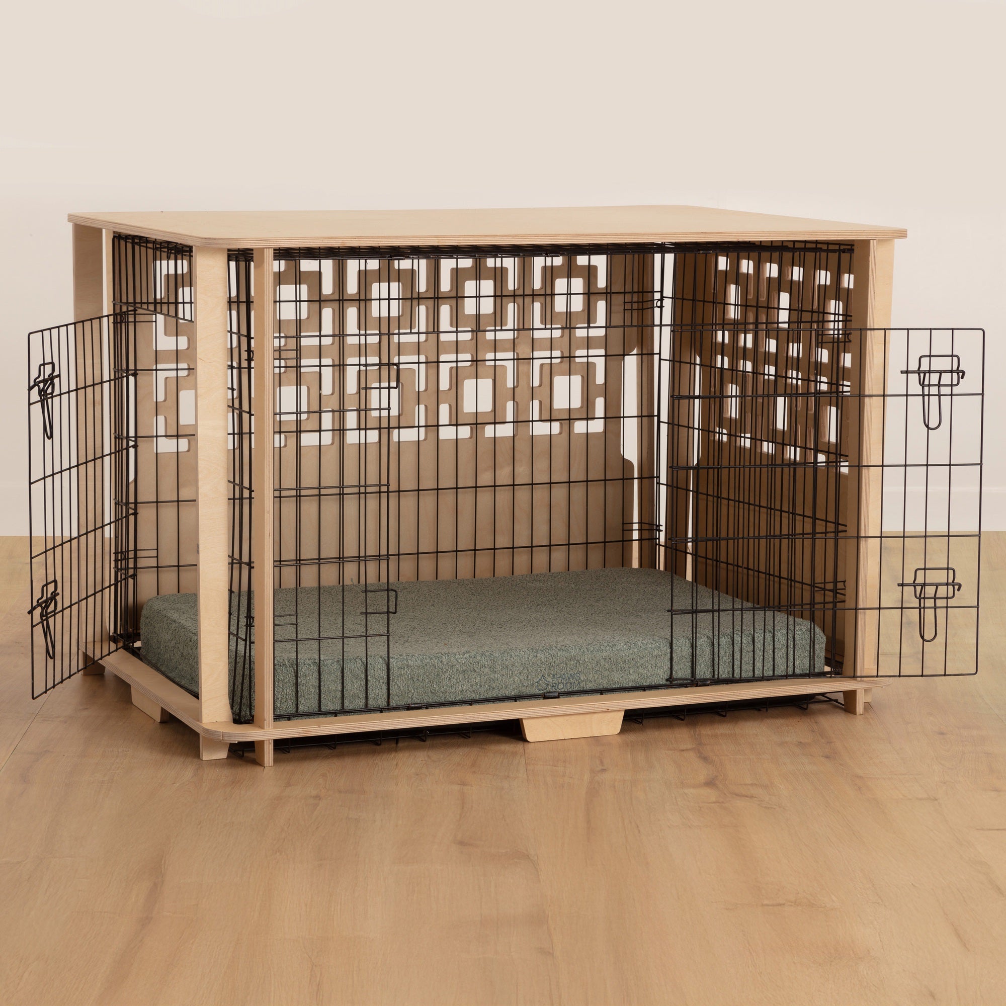 Busta crate cover in XL with breeze block pattern on back and side panel and peppa plump mat in sage demonstrating wire cover dual entry functionality